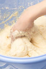 Making dough by female hands