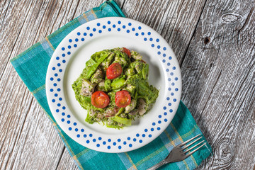 Asparagus tagliatelle with green pesto.