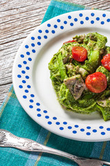 Asparagus tagliatelle with green pesto.