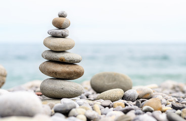 Round Smooth Stones Stacked on Rocky Beach
