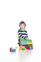 Little boy playing Bricks