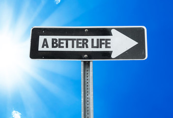 A Better Life direction sign with a beautiful day