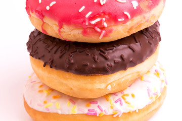 colored background baked donuts
