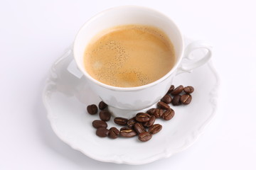 white mug of coffee beans isolated on white background ceramic china chicory