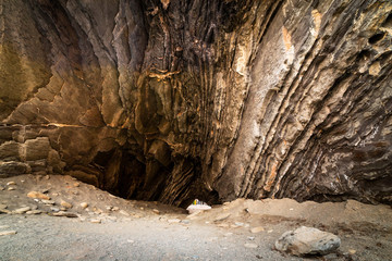 Cave at the beach of Vernazza town in Italy