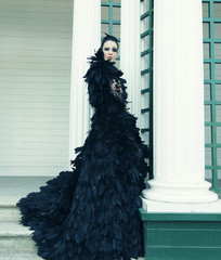 Fashion model in black dress