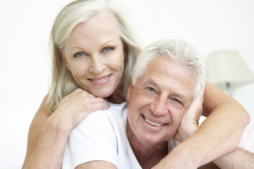 Portrait Of Romantic Senior Couple At Home