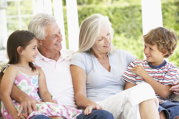 Grandparents Sitting Outisde with Grandchildren