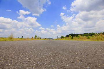 Stock Photo - Road and cloud on blue sky.