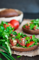 Italian tomato bruschetta with chopped vegetables, herbs and oil