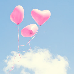 Fototapeta na wymiar Pink heart balloons