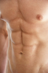 Fototapeta premium Close Up Of Bare Chested Young Man