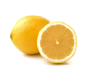 Lemon with leaves on a white background.