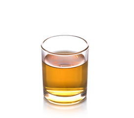 Glass of scotch whiskey isolated over white background