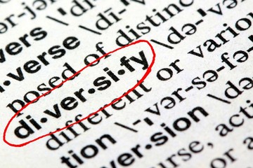 Closeup of the word diversify in the English dictionary