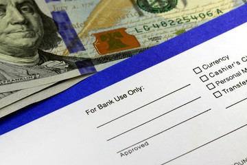 Business income banking transfer slip - Finance and accounting concept