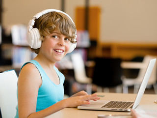 Boy spending time with notebook