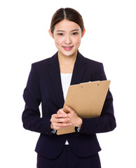 Young businesswoman holding with file pad