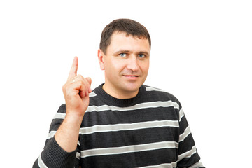 Portrait of man pointing his forefinger up