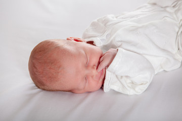 Newborn baby peacefully sleeping