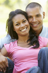 Obraz premium Portrait Of Romantic Young African American Couple In Park
