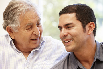 Hispanic father and adult son