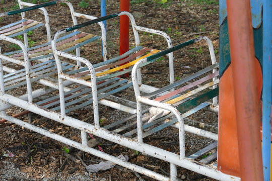 old metal seat in kid playground