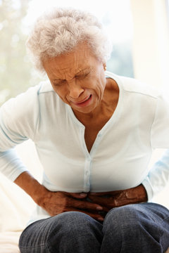 Senior Woman With Stomach Ache