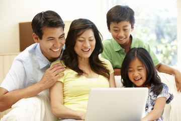 Asian family with laptop