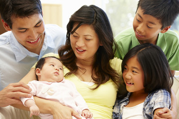 Asian family with baby