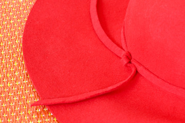 red hat on red mat