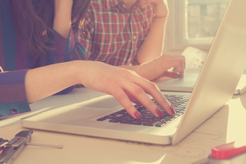 Young group of people on laptops.