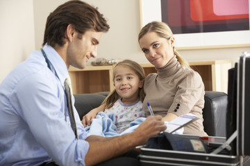 Fototapeta premium Doctor visiting sick child and mother at home