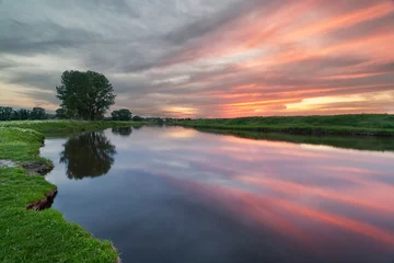 Zelfklevend Fotobehang sunset on the river © pobaralia