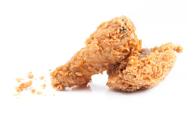 Golden brown fried chicken drumsticks
