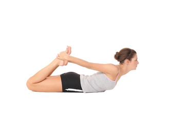 Obraz na płótnie Canvas Young woman training yoga