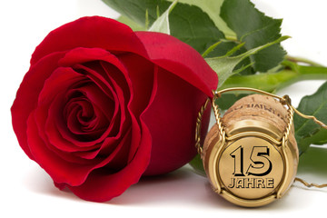 rote Rose mit Champagnerkorken 15 Jahre Jubiläum