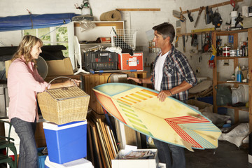 Couple Clearing Garage For Yard Sale