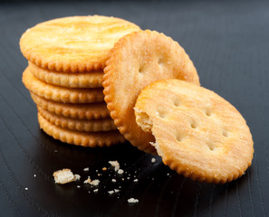 cracker on black  wooden