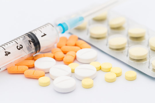Syringe and tablet drug