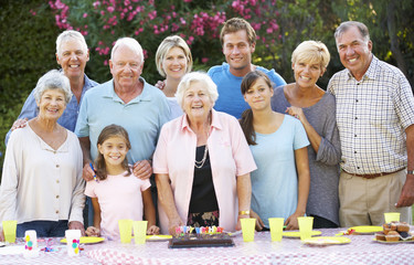 Large Family Group Celebrating Birthday Outdoors