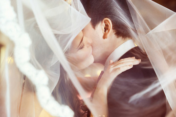 Closeup portrait of beautiful wedding couple kiss