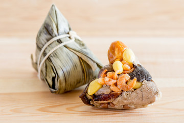 Asian Chinese rice dumplings or zongzi on wooden background