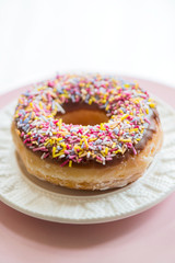 Glazed Doughnut with colourful sprinkles