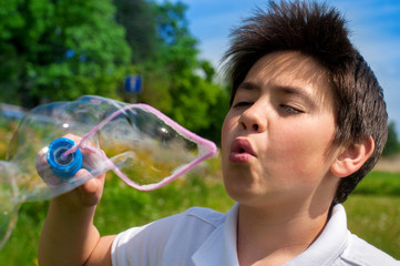 Boy and soap bubbles
