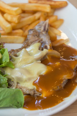 pork chop steak with cheese and black pepper mushroom gravy