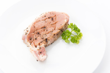 raw meat pork steak with black peppers