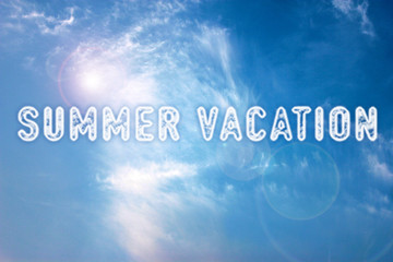 SUMMER VACATION written in the blue sky