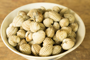 Blood cockle or Anadara granosa or blood clam in a white bowl