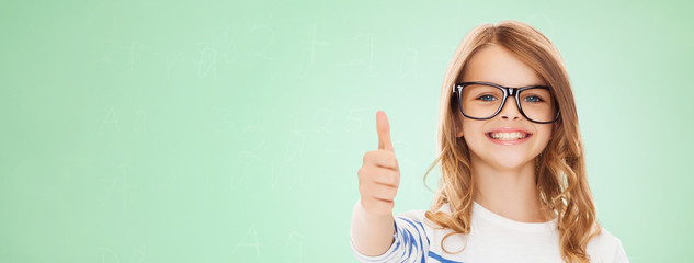 little girl with black eyeglasses